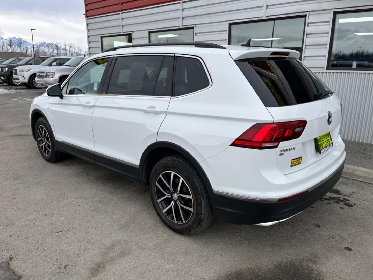 2021 White Volkswagen Tiguan SE 4Motion AWD (3VV2B7AX9MM) with an 2.0L L4 DOHC 16V TURBO engine, 8A transmission, located at 1960 Industrial Drive, Wasilla, 99654, (907) 274-2277, 61.573475, -149.400146 - Photo#3